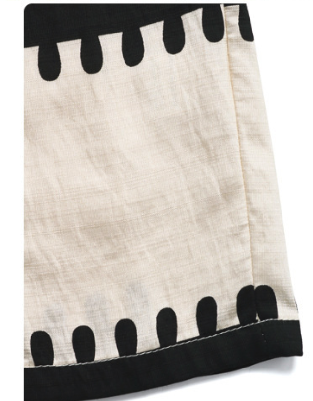 Mono bohemio sin tirantes con estampado tribal y fruncido, pernera ancha.