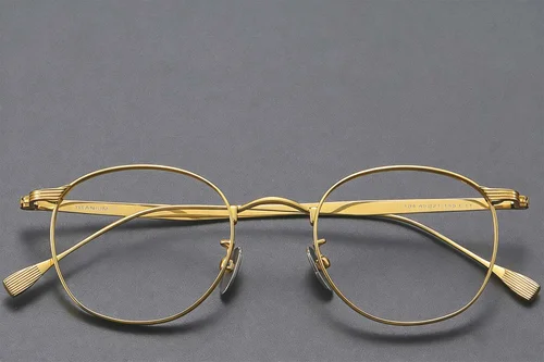 Lunettes ovales en titane doré #BS1913-0351