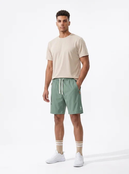 Pantaloncini sportivi da uomo in seta ghiaccio ad asciugatura rapida con tasche con cerniera