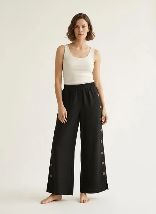 Pantalon palazzo noir à jambes larges et boutons latéraux