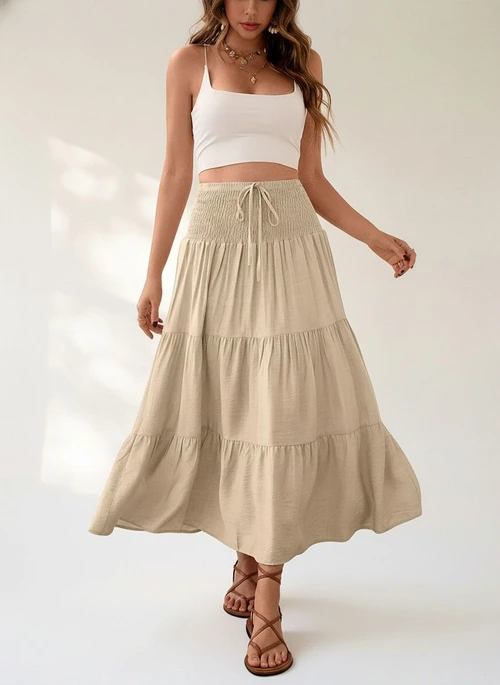 Jupe longue bohème beige à volants et taille smockée