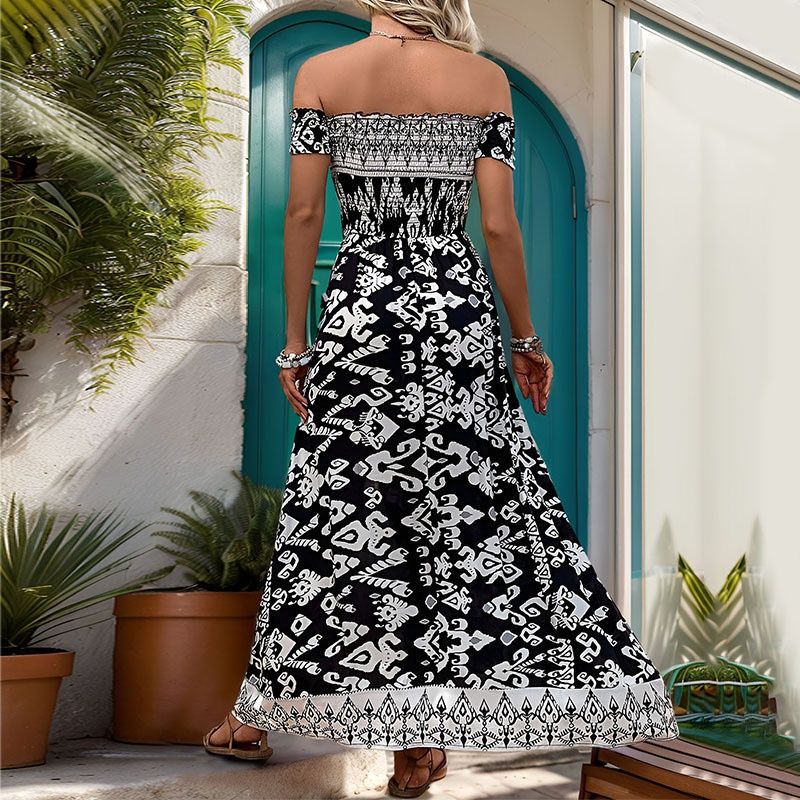 Vestido largo bohemio en blanco y negro con hombros descubiertos y abertura