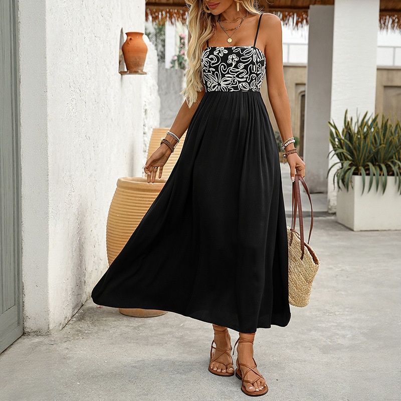 Vestido midi negro de mujer con bordado floral y fruncido