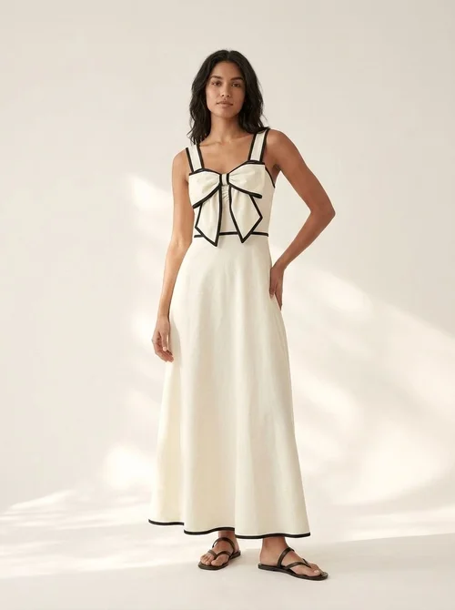 Elegantes Midikleid mit Schleife vorne und kontrastierendem Besatz