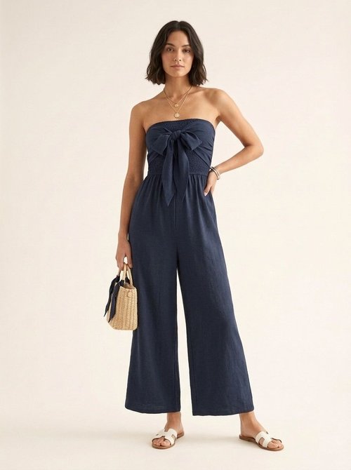 Combinaison bustier bleu marine à jambes larges et nœud papillon sur le devant