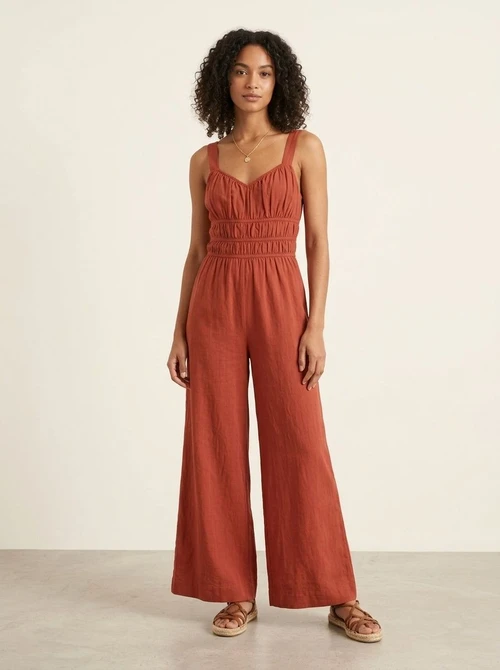 Combinaison pantalon large à smocks orange brûlé avec poches