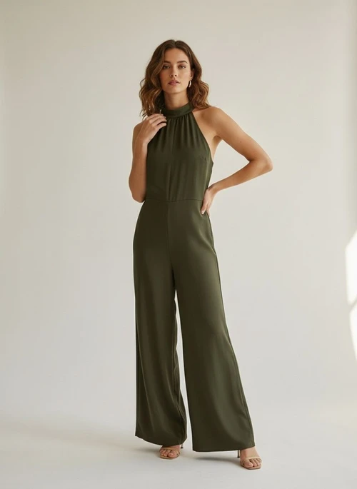 Combinaison élégante à jambes larges et col halter avec détail noué dans le dos
