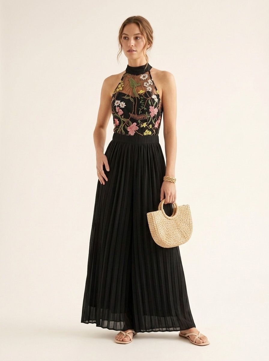 Combinaison noire à fleurs, dos nu, plissée, jambes larges