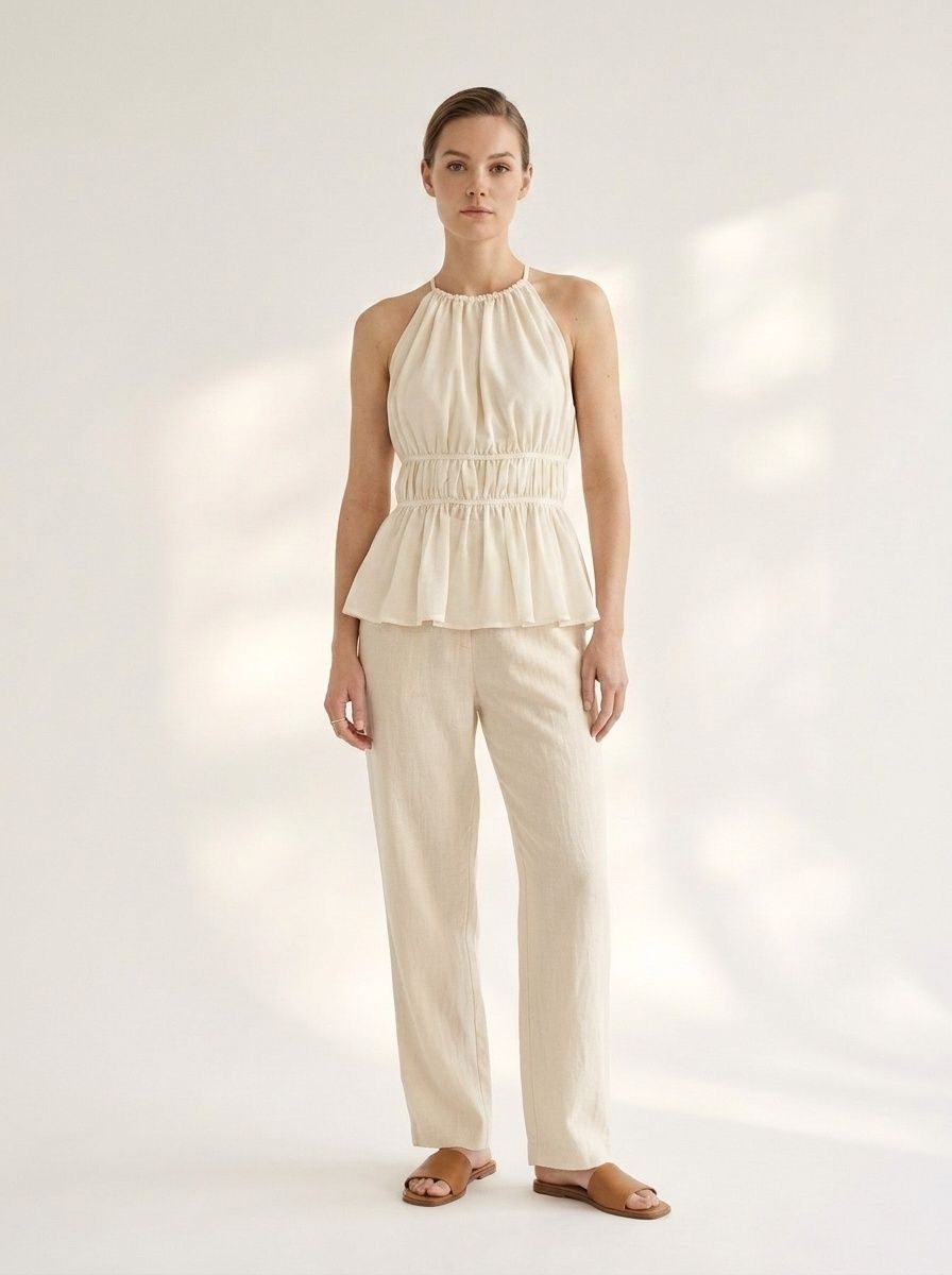 Haut péplum froncé à col halter pour femme