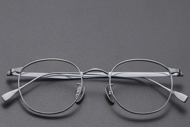 Ovale zilverkleurige titanium bril #BS1913-0352