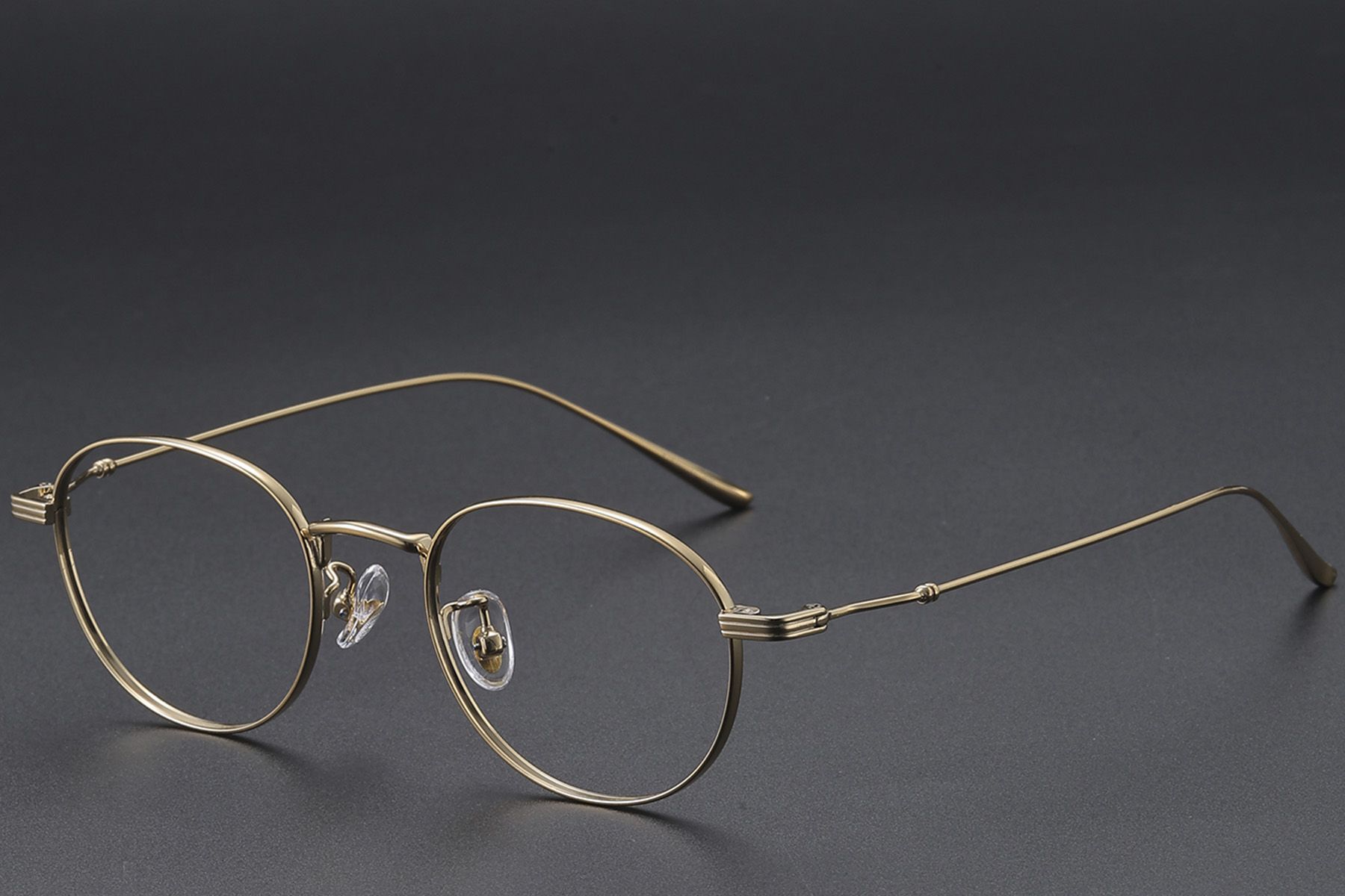 Gafas ovaladas de titanio dorado #BS1913-0573