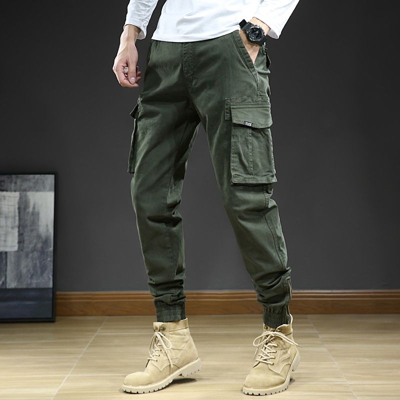 Pantalones cargo elásticos con puños de inspiración vintage para hombre, ideales para uso informal al aire libre.