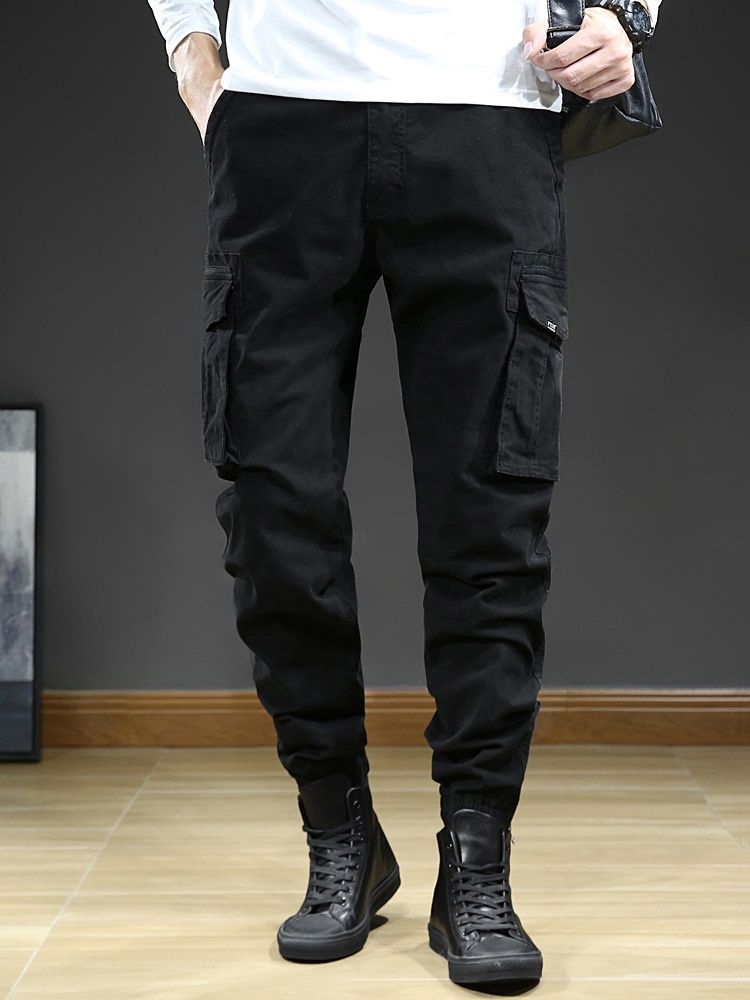 Pantalones cargo elásticos con puños de inspiración vintage para hombre, ideales para uso informal al aire libre.