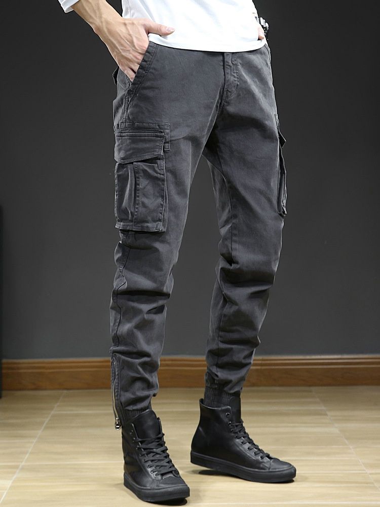 Pantalones cargo elásticos con puños de inspiración vintage para hombre, ideales para uso informal al aire libre.