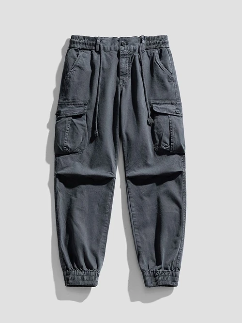 Pantalon cargo slim stretch vintage à revers pour homme, idéal pour une tenue de sport décontractée.