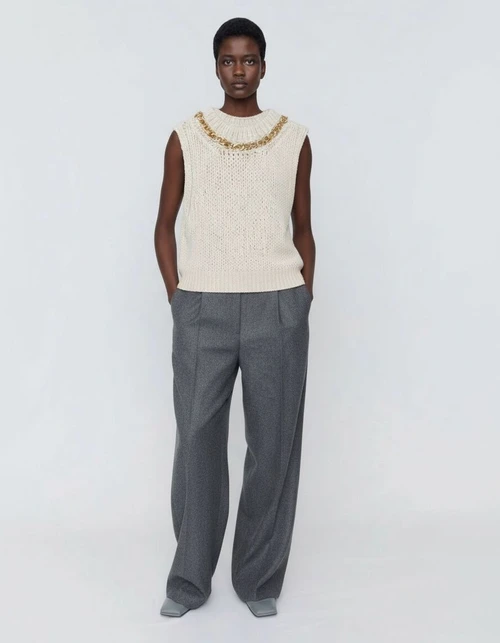 Top da donna con finiture a catena e orlo asimmetrico KUN-00021