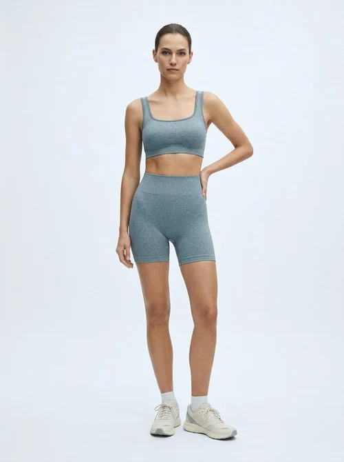 Pantaloncini da yoga a vita alta snellenti da donna con una vestibilità sexy a forma di S.
