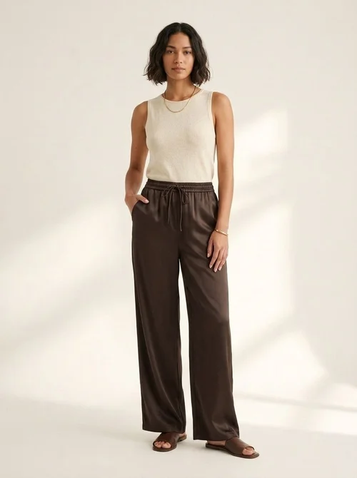 Pantaloni a gamba larga con coulisse in similpelle