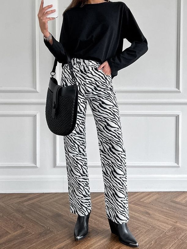 Vaqueros rectos de talle alto con estampado de cebra