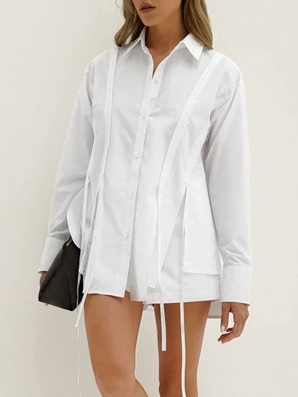 Camisa blanca de manga larga con botones y detalle de lazo para mujer