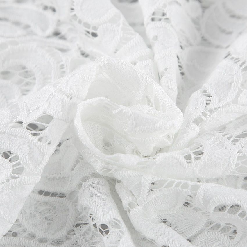 Conjunto de top peplum blanco y pantalones de encaje - Elegante y chic