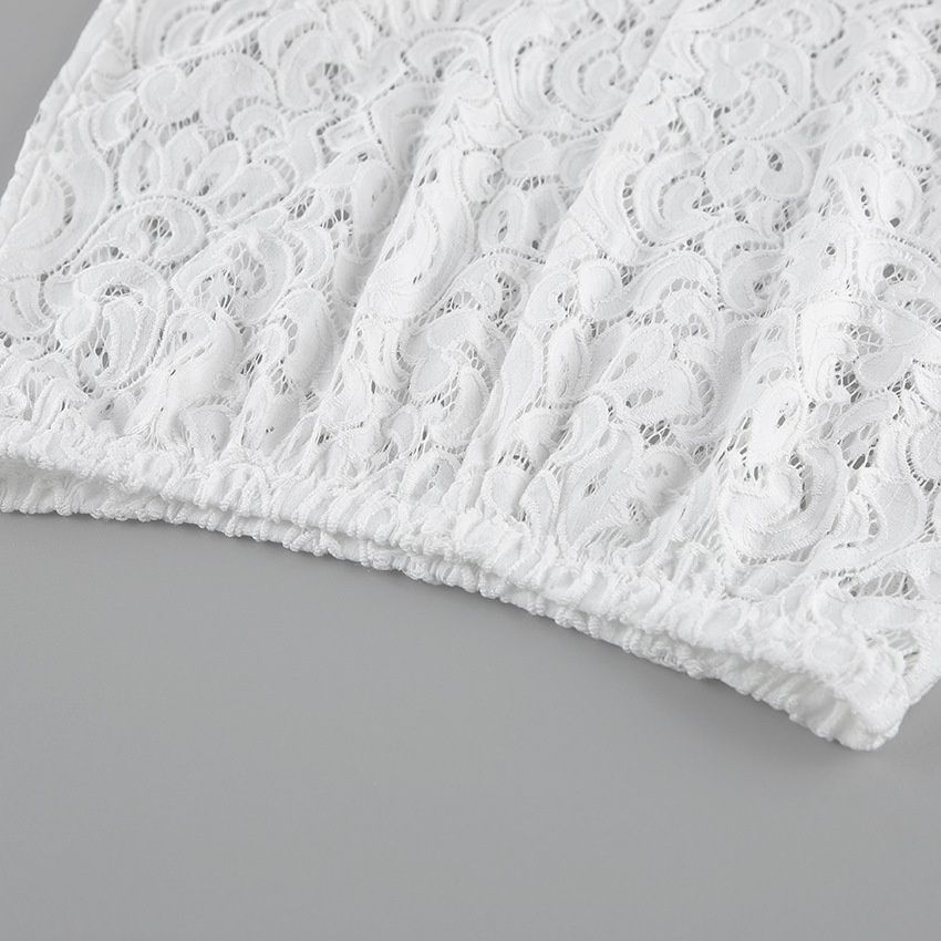 Conjunto de top peplum blanco y pantalones de encaje - Elegante y chic