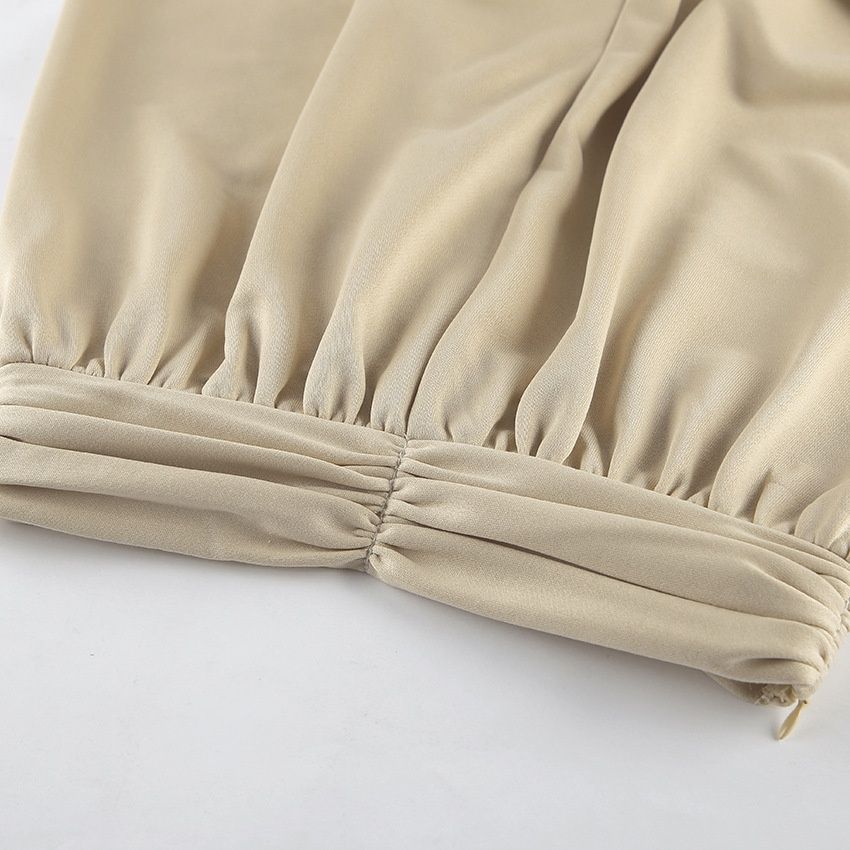 Conjunto elegante de top corto de manga ancha y pantalón de pierna ancha con cintura en V.