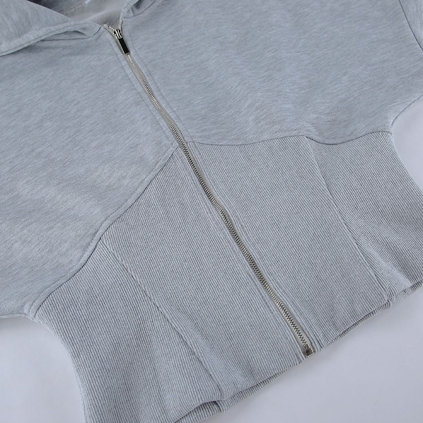 Conjunto de sudadera con capucha tipo corsé acanalada y pantalón deportivo de pierna ancha.