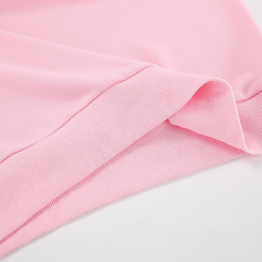 Conjunto de sudadera con cremallera hasta el cuello y pantalón de pierna ancha para mujer.