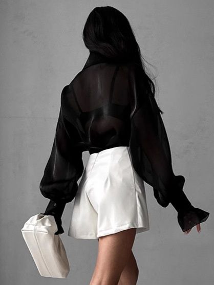 Blusa oversize abotonada de organza transparente