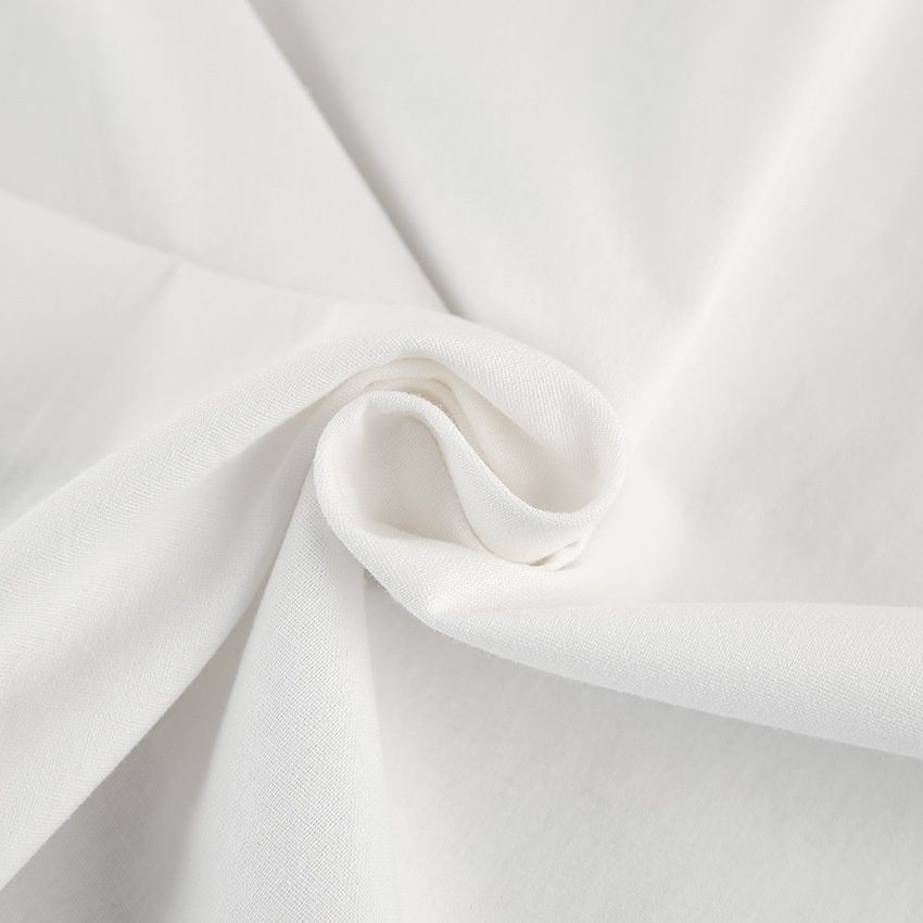 Top asimétrico con cuello halter y espalda anudada - Elegante mezcla de lino blanco