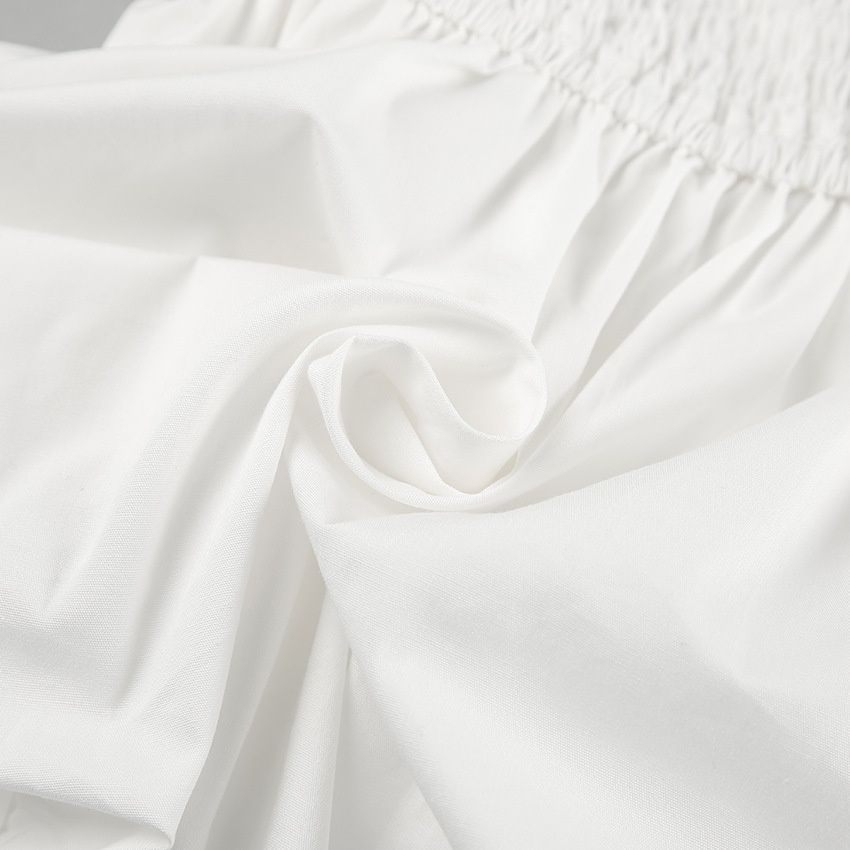 Top de burbuja peplum blanco sin tirantes elegante