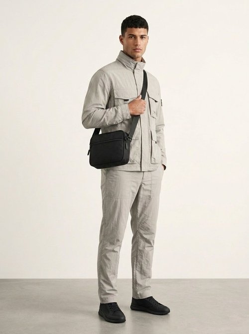 Sleek Black Crossbody Bag - Durable & Multi-Pocket
