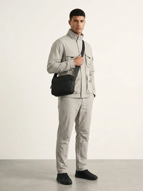 Sleek Black Crossbody Bag - Durable & Multi-Pocket