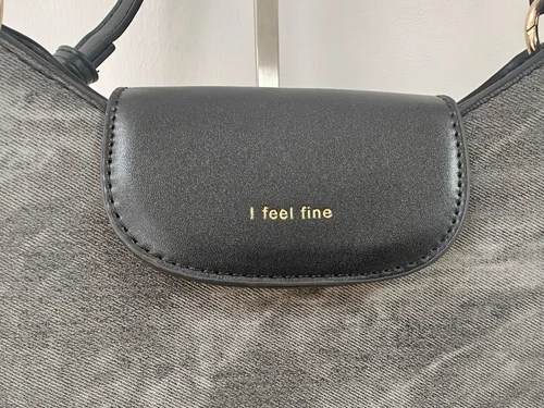 Schultertasche in Used-Optik, grau, mit geflochtenem Riemen