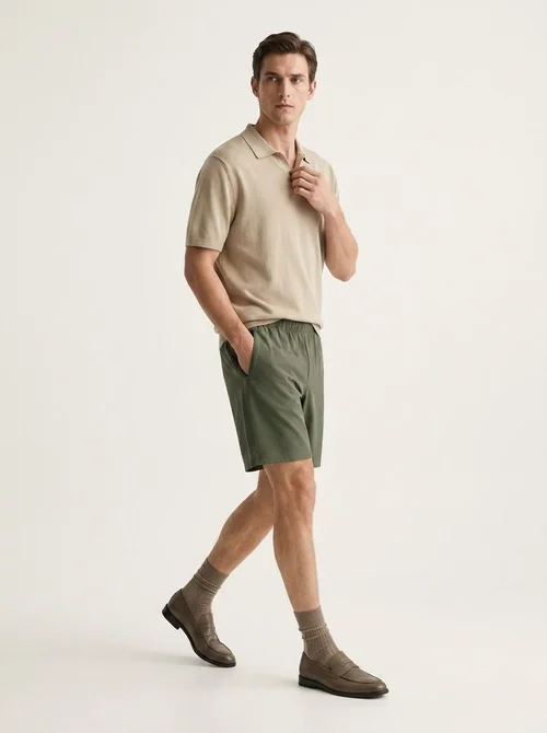 Pantaloncini sportivi da uomo in tessuto Teflon ad asciugatura rapida con tasche con cerniera.