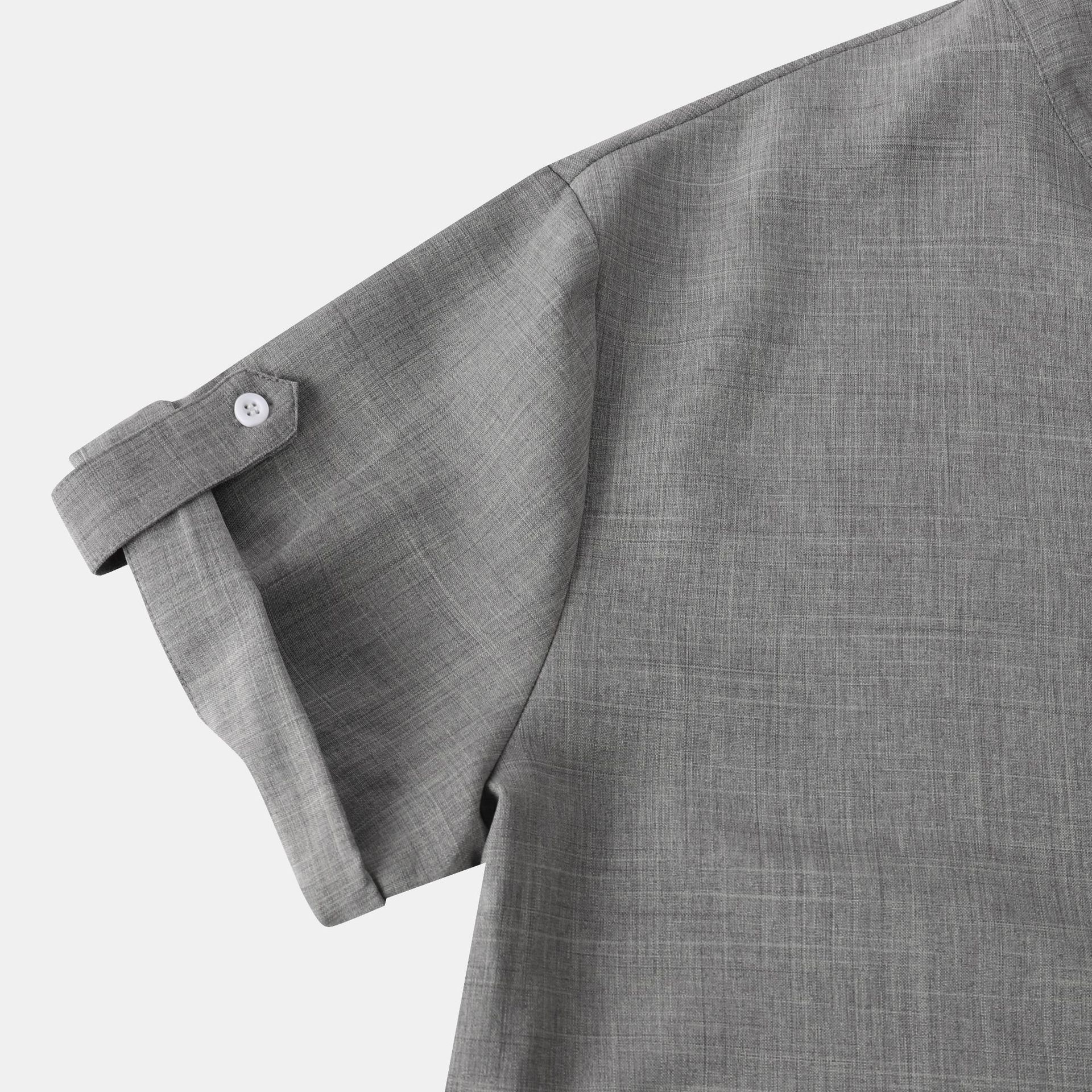 Conjunto de camisa y pantalones cortos de manga corta con cuello alto de color liso para hombre de principios de verano