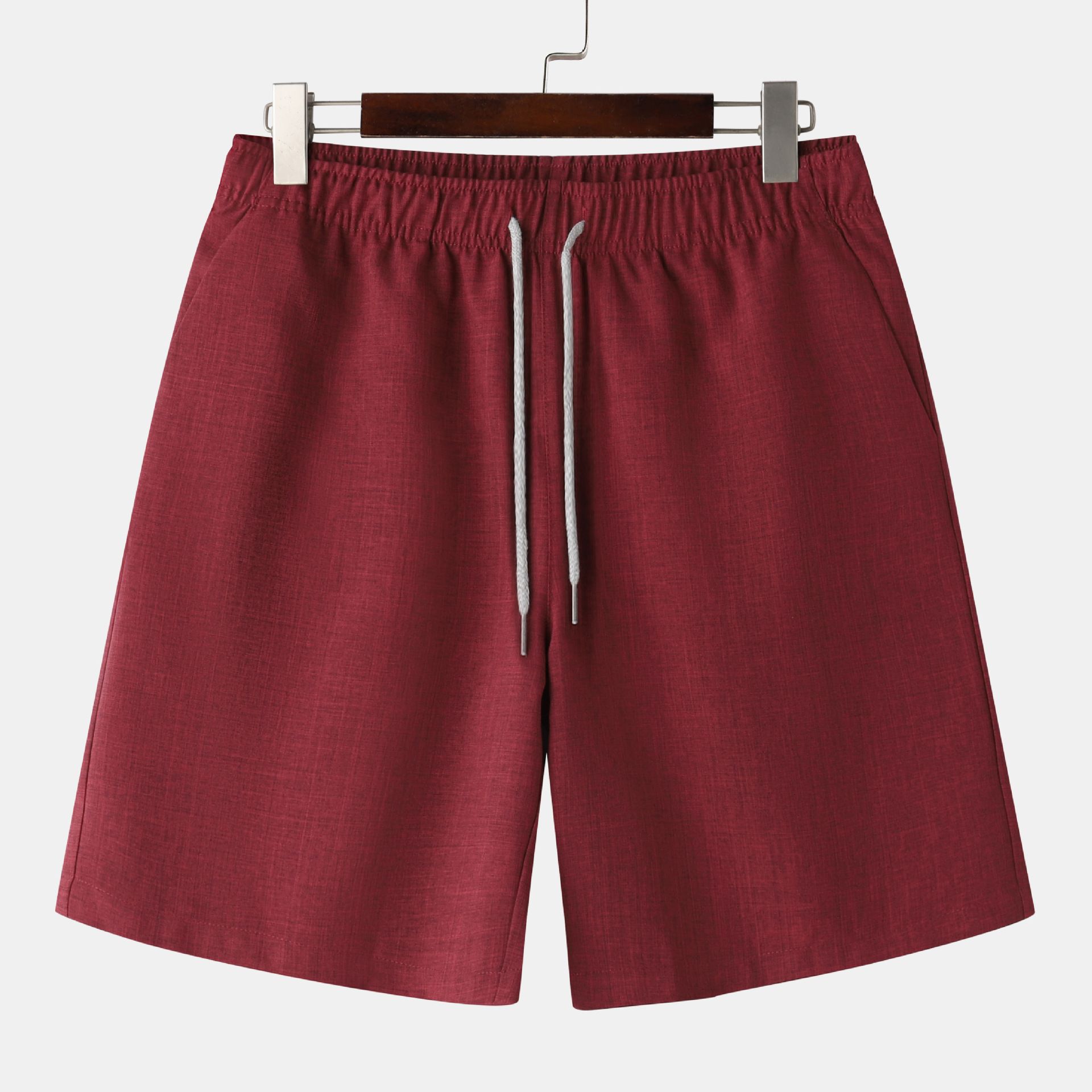 Conjunto de camisa y pantalones cortos de manga corta con cuello alto de color liso para hombre de principios de verano