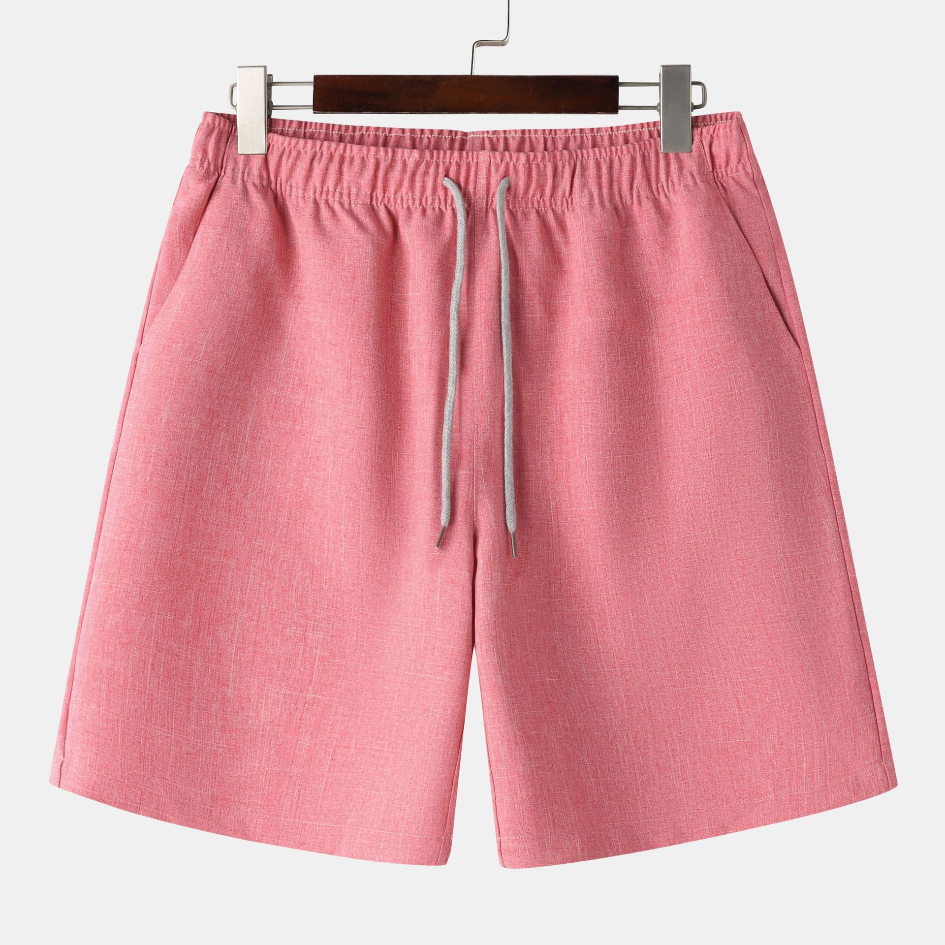 Conjunto de camisa y pantalones cortos de manga corta con cuello alto de color liso para hombre de principios de verano