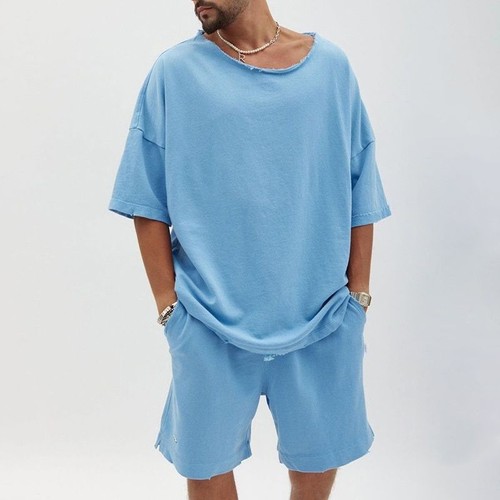 Conjunto informal de camiseta y pantalones cortos de poliéster transpirable de talla grande con cuello redondo y manga corta para hombre