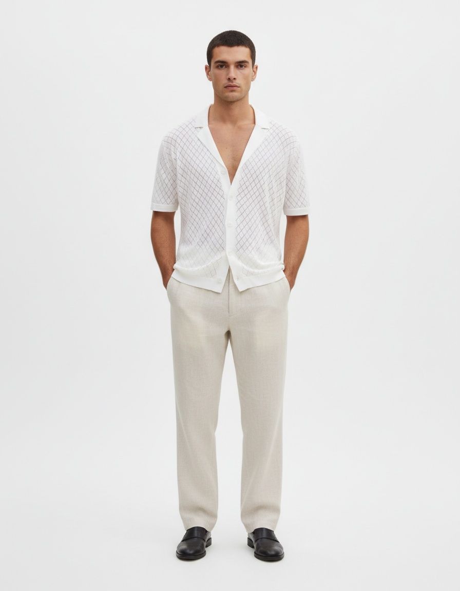 Camisa de punto transpirable de manga corta con botones en jacquard para uso informal de verano para hombre.