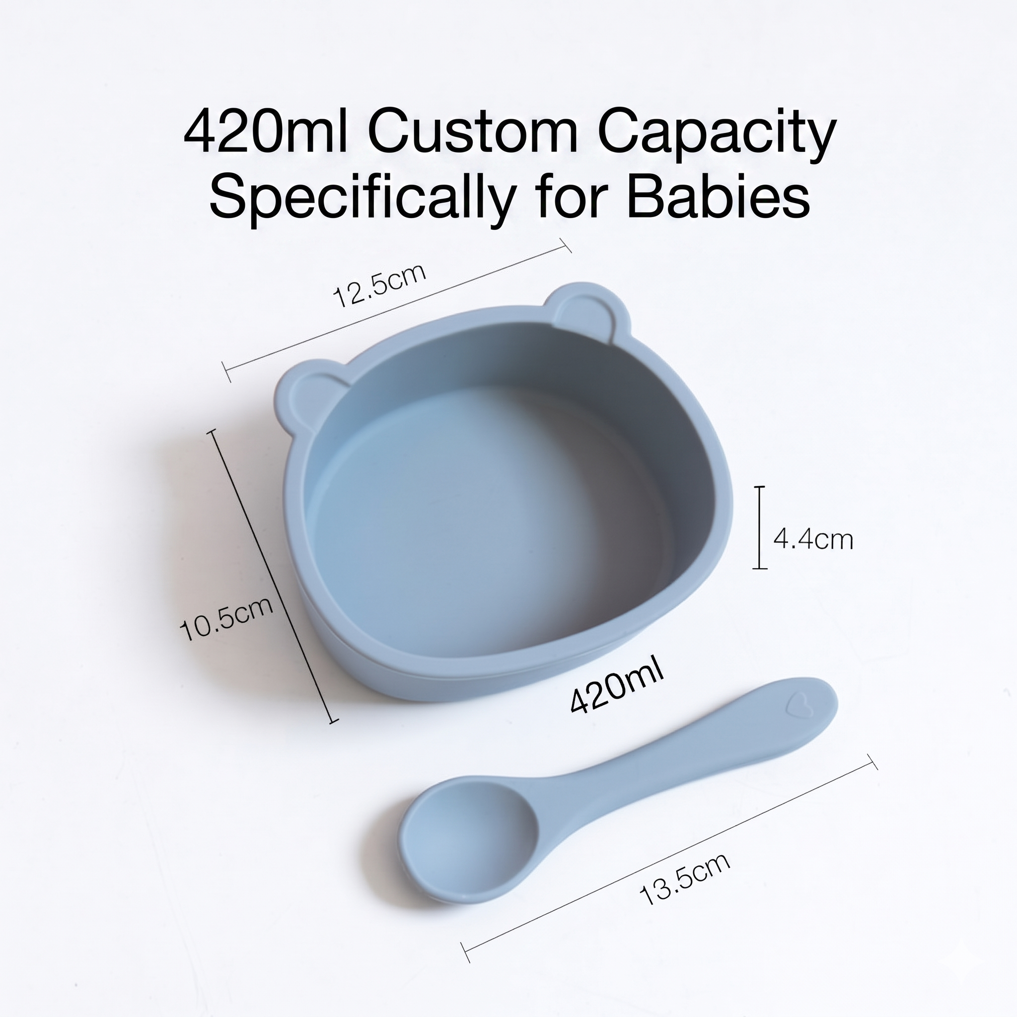 Set di ciotola e cucchiaio in silicone a forma di orsetto per la pappa del bambino.