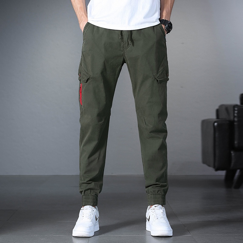 Minimalistische stretch vintage cargo broek met omslag voor heren, geschikt voor casual gebruik.