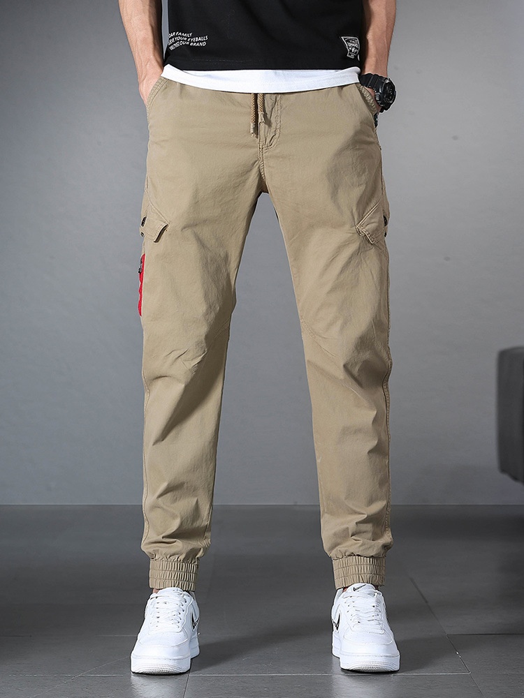 Minimalistische stretch vintage cargo broek met omslag voor heren, geschikt voor casual gebruik.