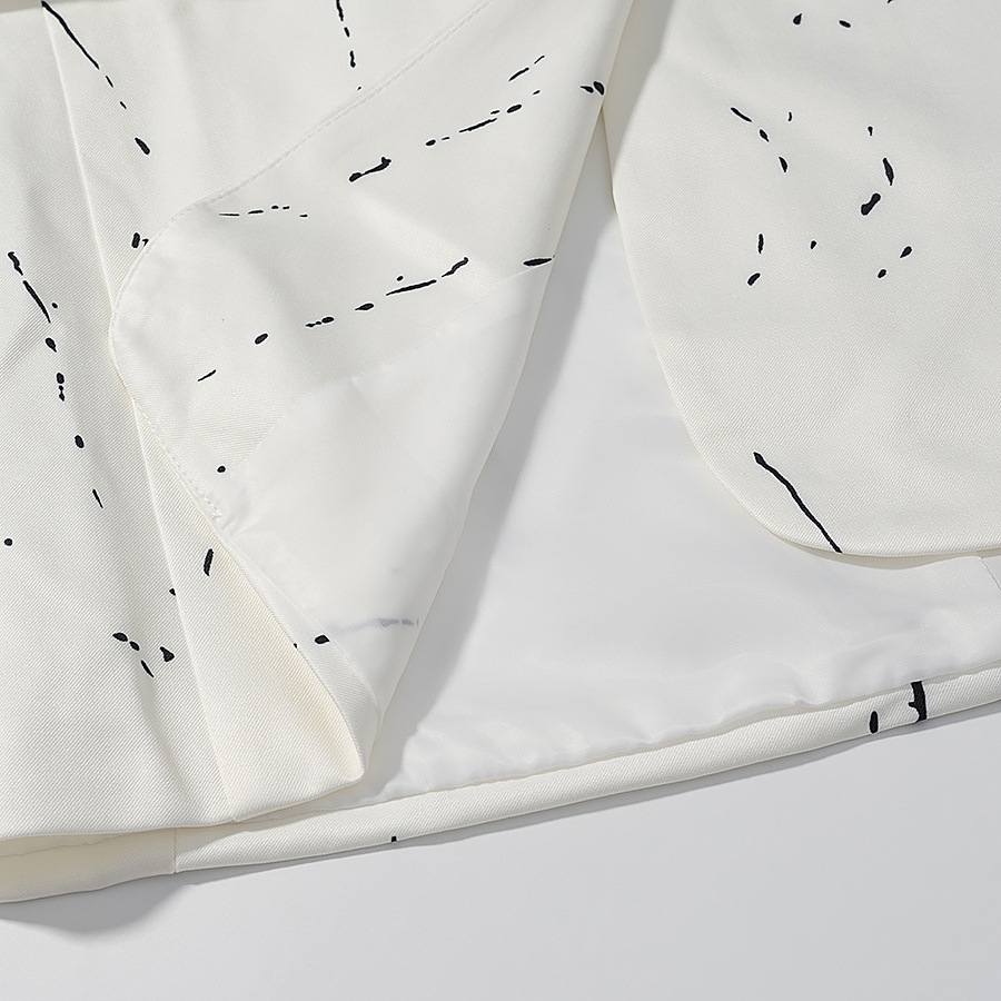 Blazer de mujer con cuello en V, hombros acolchados y diseño de grafiti deconstruido KUN-00021