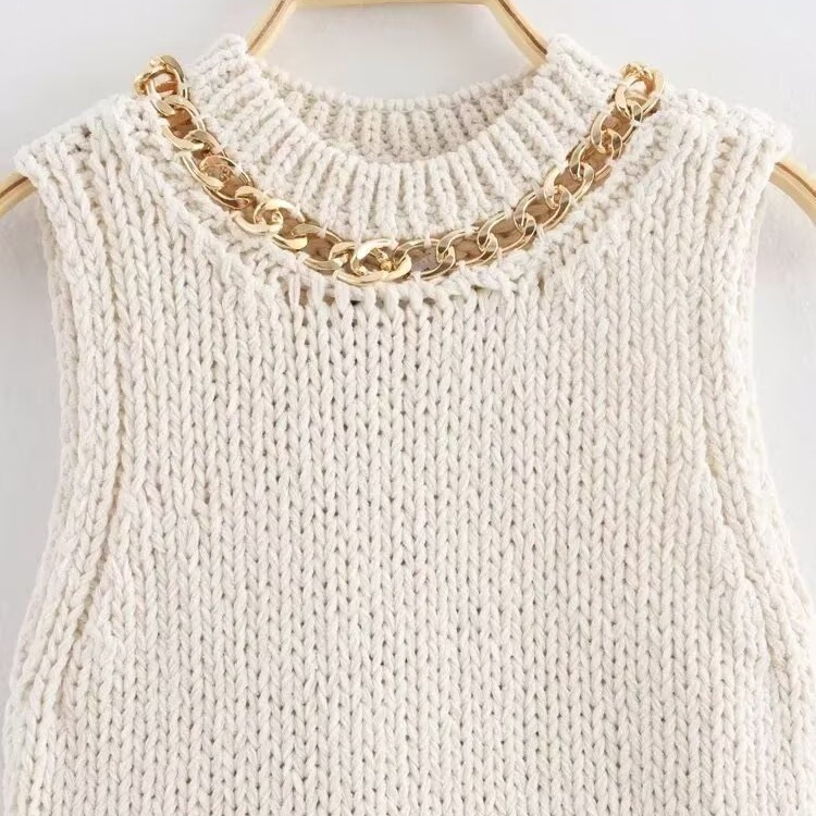 Top da donna con finiture a catena e orlo asimmetrico KUN-00021