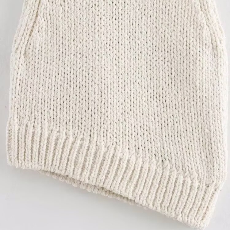 Top da donna con finiture a catena e orlo asimmetrico KUN-00021