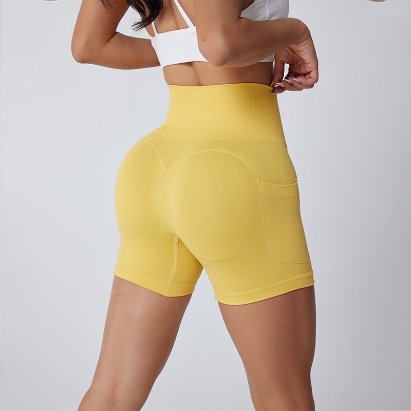 Ademende yoga shorts met hoge taille en afslankend effect voor dames, inclusief buikcorrectie.