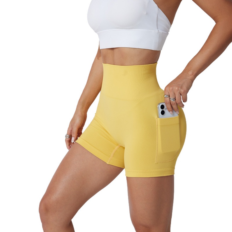 Ademende yoga shorts met hoge taille en afslankend effect voor dames, inclusief buikcorrectie.