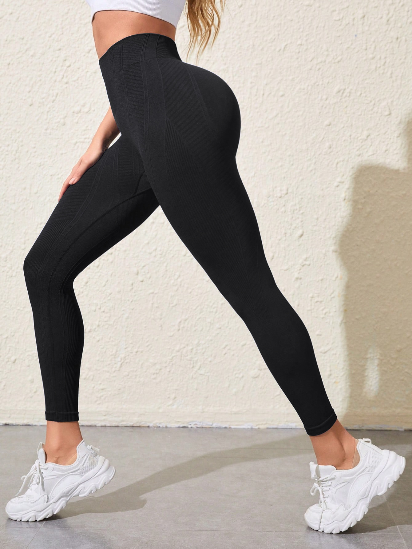 Pantalones de yoga de secado rápido de talle alto para mujer con un ajuste sexy en forma de S.